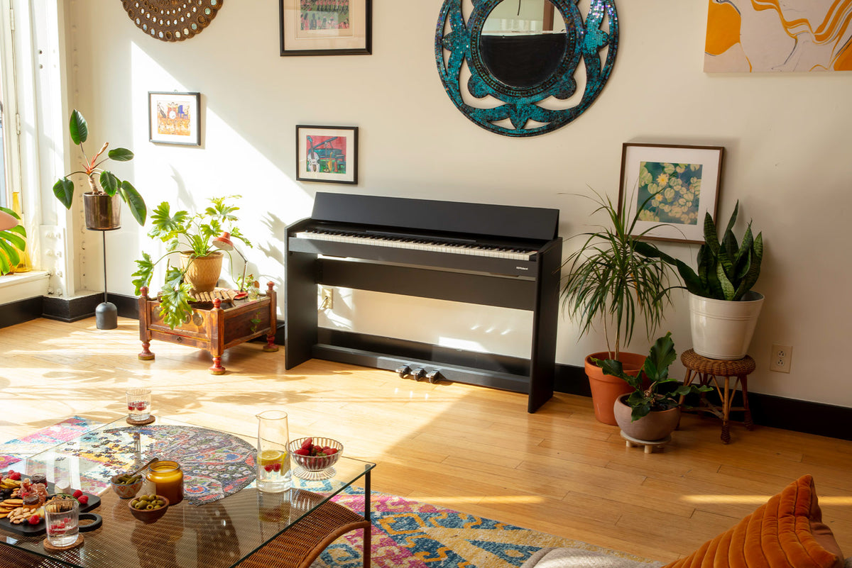 Roland F107 slim digital piano in a contemporary home