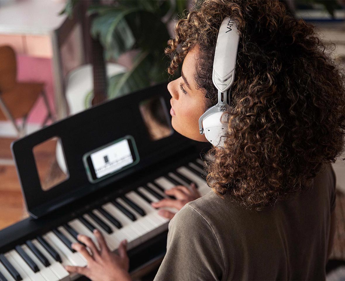 Roland FP-10 digital piano with headphones for quiet practice