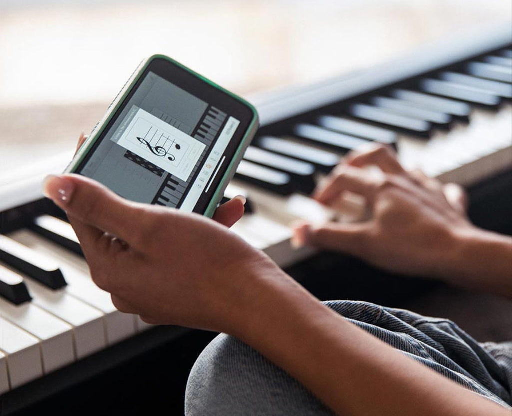 Roland FP-10 digital piano with smartphone music app