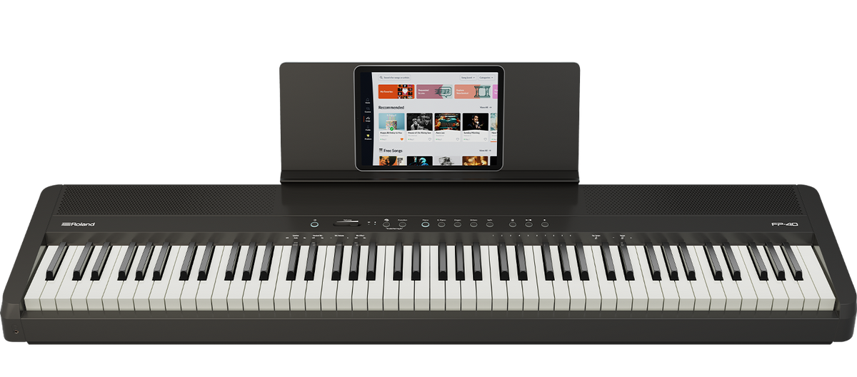 Roland FP-40 digital piano with Piano Sphere app on tablet