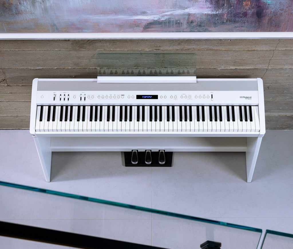 Roland FP-60X digital piano in a home setting