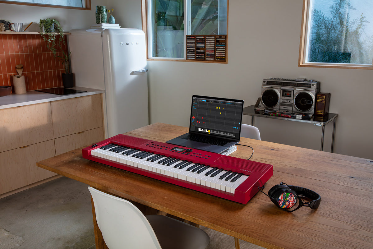 Roland GO:KEYS 3 music creation keyboard in a home studio setting
