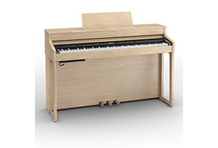 Roland HP702 digital piano in Light Oak