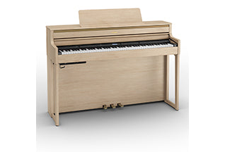 Roland HP704 digital piano in Light Oak