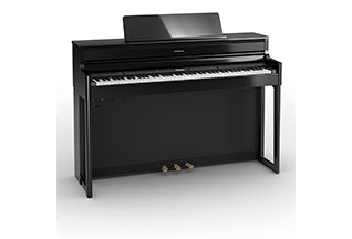 Roland HP704 digital piano in Polished Ebony